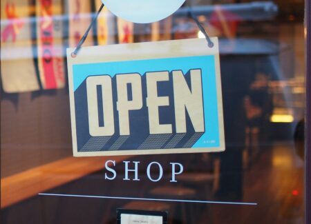 gray and blue Open signage